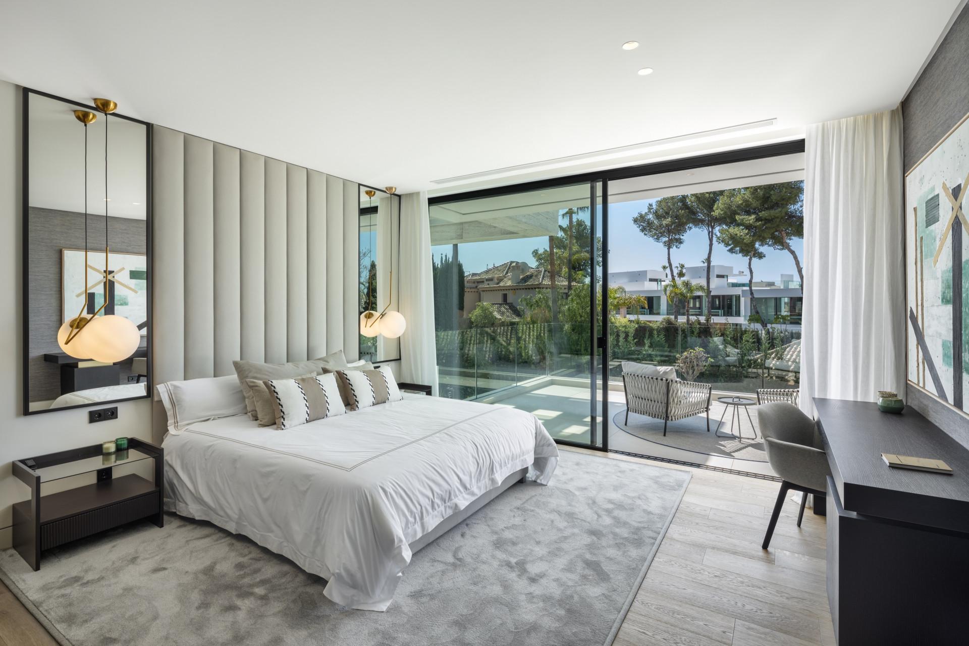 Luxury master bedroom at Embassy Knowledge Park Villas