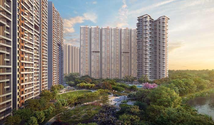 Lodha Beaumont Estate lake landscape with flowering African Tulip trees at Sadahalli Bangalore