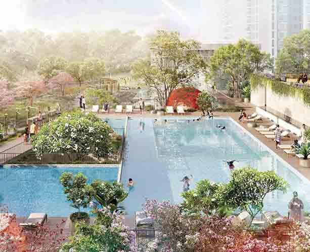 Lodha Beaumont Estate swimming pool surrounded by landscaped gardens at Sadahalli Bangalore